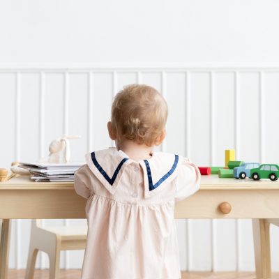 Toddler playing in her play room